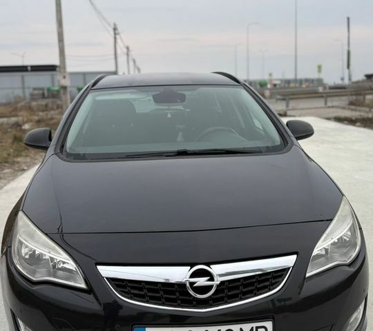 Черный Опель Астра, объемом двигателя 1.25 л и пробегом 230 тыс. км за 4700 $, фото 1 на Automoto.ua