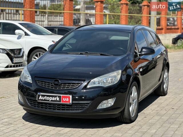 Чорний Опель Астра, об'ємом двигуна 2 л та пробігом 223 тис. км за 6490 $, фото 1 на Automoto.ua
