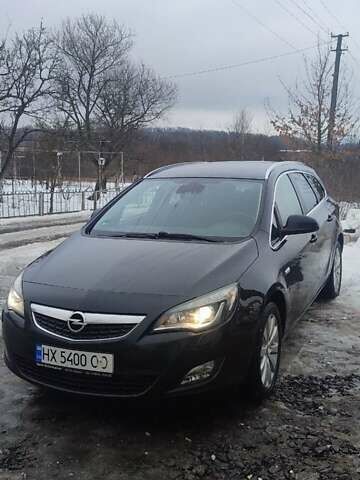 Черный Опель Астра, объемом двигателя 1.7 л и пробегом 232 тыс. км за 7700 $, фото 1 на Automoto.ua