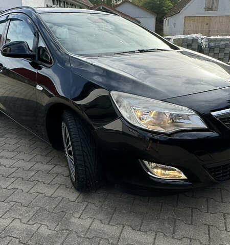 Черный Опель Астра, объемом двигателя 1.3 л и пробегом 226 тыс. км за 5500 $, фото 1 на Automoto.ua