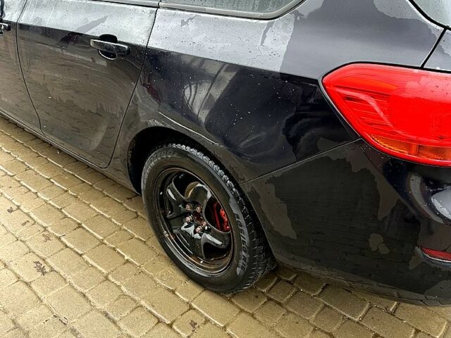 Черный Опель Астра, объемом двигателя 1.2 л и пробегом 264 тыс. км за 6500 $, фото 1 на Automoto.ua