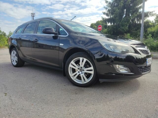 Черный Опель Астра, объемом двигателя 1.4 л и пробегом 209 тыс. км за 6700 $, фото 1 на Automoto.ua