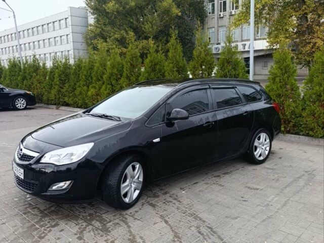 Черный Опель Астра, объемом двигателя 2 л и пробегом 213 тыс. км за 6400 $, фото 1 на Automoto.ua