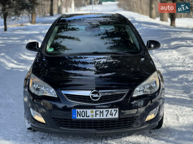 Черный Опель Астра, объемом двигателя 1.6 л и пробегом 230 тыс. км за 7300 $, фото 1 на Automoto.ua