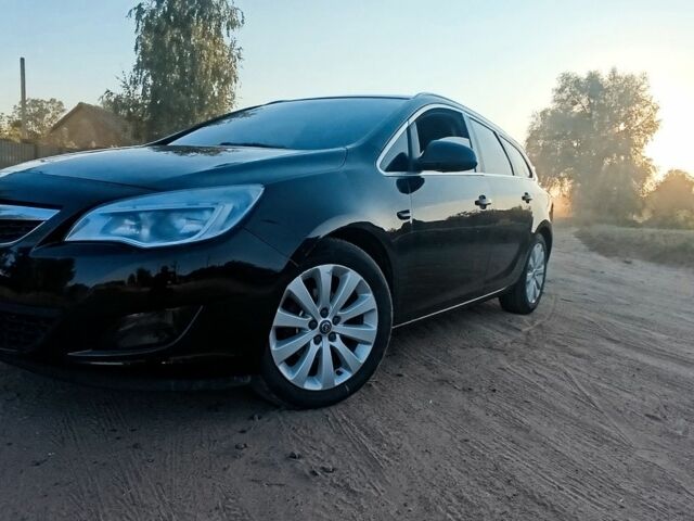 Чорний Опель Астра, об'ємом двигуна 1.3 л та пробігом 300 тис. км за 6017 $, фото 1 на Automoto.ua
