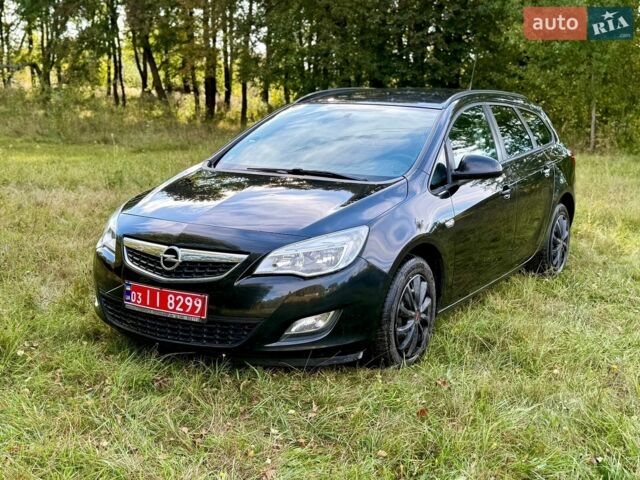 Черный Опель Астра, объемом двигателя 1.6 л и пробегом 177 тыс. км за 7700 $, фото 1 на Automoto.ua