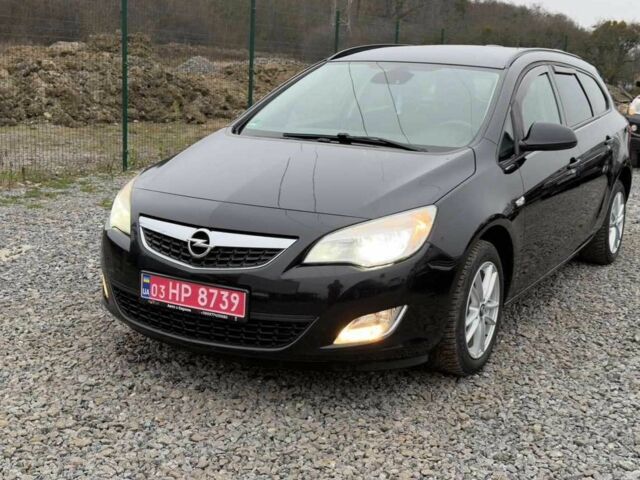 Черный Опель Астра, объемом двигателя 1.6 л и пробегом 237 тыс. км за 7214 $, фото 1 на Automoto.ua