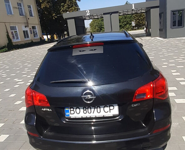 Черный Опель Астра, объемом двигателя 1.7 л и пробегом 258 тыс. км за 7400 $, фото 1 на Automoto.ua