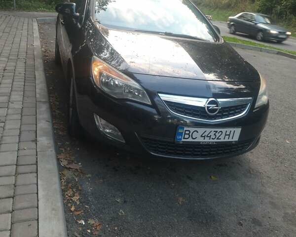 Черный Опель Астра, объемом двигателя 1.7 л и пробегом 287 тыс. км за 7400 $, фото 1 на Automoto.ua