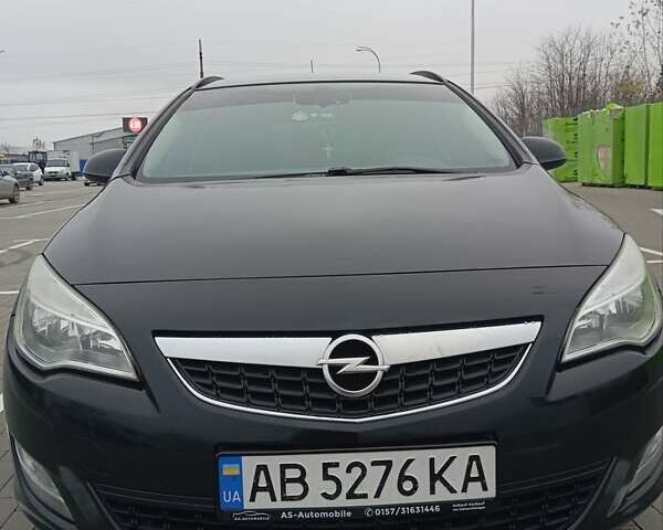 Черный Опель Астра, объемом двигателя 1.69 л и пробегом 320 тыс. км за 6600 $, фото 1 на Automoto.ua