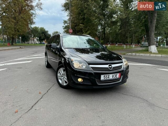 Черный Опель Астра, объемом двигателя 1.6 л и пробегом 170 тыс. км за 6399 $, фото 1 на Automoto.ua