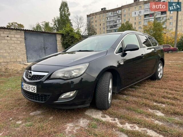 Черный Опель Астра, объемом двигателя 1.7 л и пробегом 223 тыс. км за 5900 $, фото 1 на Automoto.ua