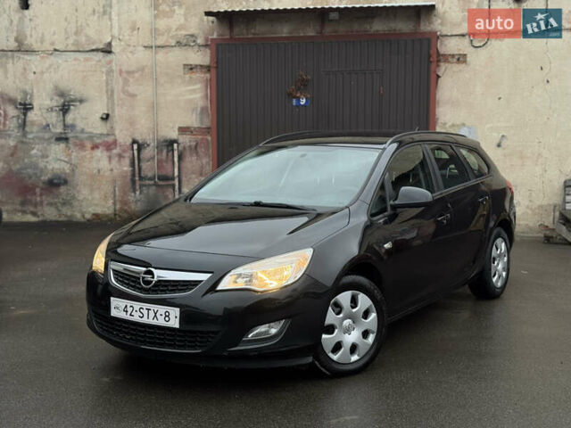 Черный Опель Астра, объемом двигателя 1.4 л и пробегом 225 тыс. км за 6350 $, фото 1 на Automoto.ua