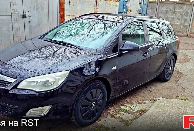 Черный Опель Астра, объемом двигателя 1.2 л и пробегом 230 тыс. км за 5500 $, фото 1 на Automoto.ua