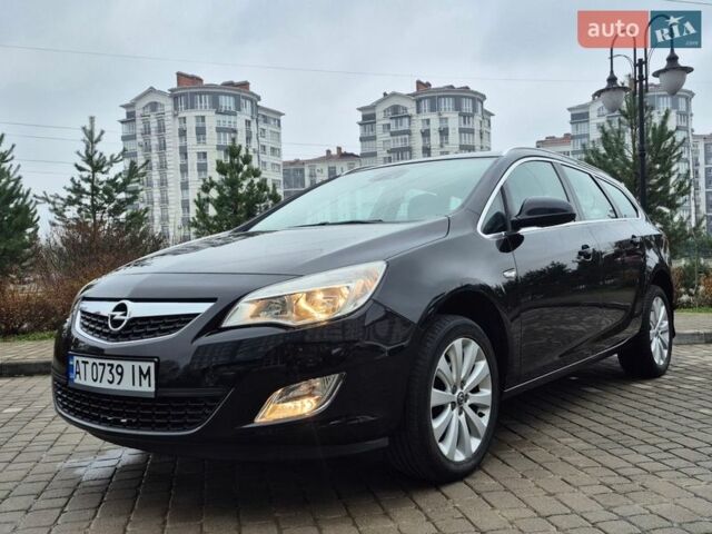 Черный Опель Астра, объемом двигателя 1.4 л и пробегом 218 тыс. км за 6500 $, фото 1 на Automoto.ua