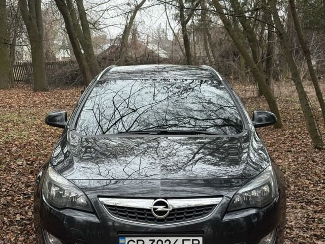 Черный Опель Астра, объемом двигателя 1.7 л и пробегом 195 тыс. км за 7800 $, фото 1 на Automoto.ua