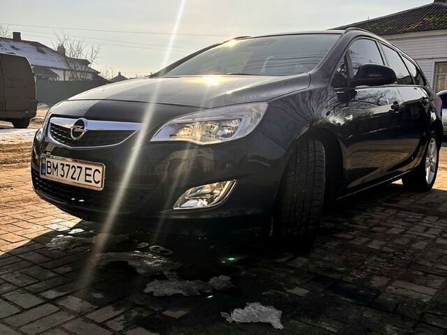 Черный Опель Астра, объемом двигателя 1.7 л и пробегом 252 тыс. км за 7000 $, фото 1 на Automoto.ua