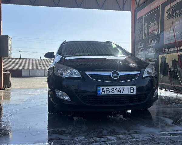 Черный Опель Астра, объемом двигателя 1.69 л и пробегом 312 тыс. км за 7400 $, фото 1 на Automoto.ua
