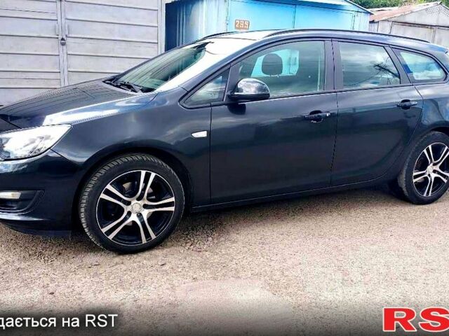 Черный Опель Астра, объемом двигателя 1.7 л и пробегом 260 тыс. км за 6300 $, фото 1 на Automoto.ua