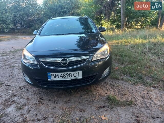 Черный Опель Астра, объемом двигателя 1.25 л и пробегом 232 тыс. км за 7200 $, фото 1 на Automoto.ua