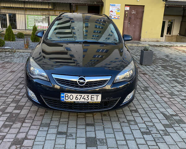 Черный Опель Астра, объемом двигателя 1.7 л и пробегом 260 тыс. км за 7500 $, фото 1 на Automoto.ua
