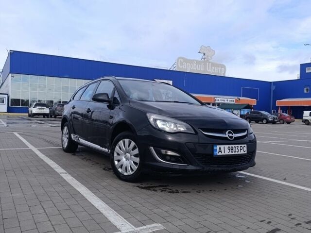 Черный Опель Астра, объемом двигателя 1.7 л и пробегом 272 тыс. км за 5950 $, фото 1 на Automoto.ua