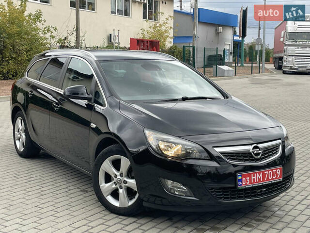 Черный Опель Астра, объемом двигателя 1.6 л и пробегом 125 тыс. км за 7450 $, фото 1 на Automoto.ua