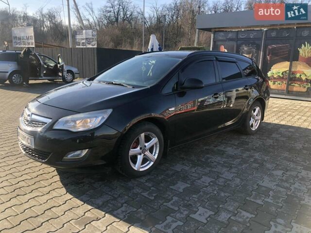 Чорний Опель Астра, об'ємом двигуна 1.28 л та пробігом 242 тис. км за 6200 $, фото 1 на Automoto.ua