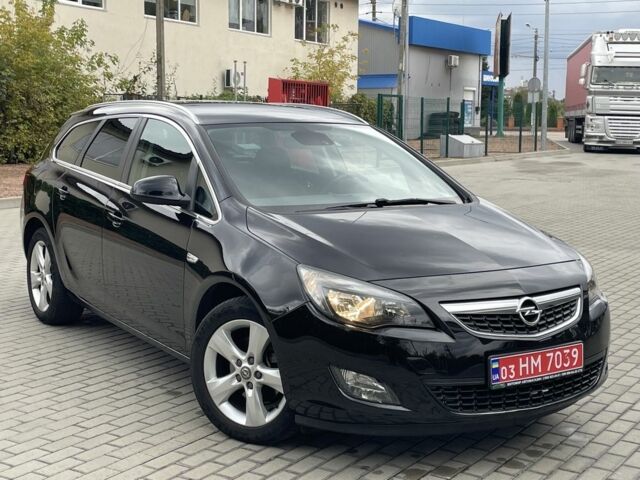 Черный Опель Астра, объемом двигателя 1.6 л и пробегом 125 тыс. км за 7450 $, фото 1 на Automoto.ua