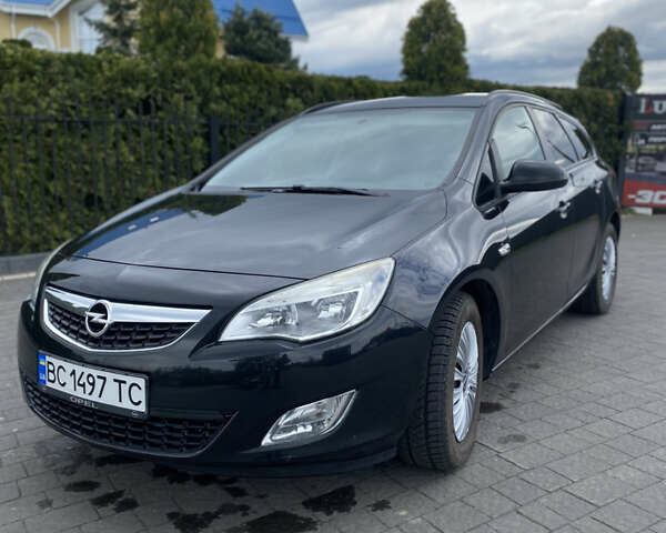 Черный Опель Астра, объемом двигателя 1.7 л и пробегом 265 тыс. км за 6300 $, фото 1 на Automoto.ua