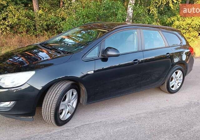 Черный Опель Астра, объемом двигателя 2 л и пробегом 308 тыс. км за 7400 $, фото 1 на Automoto.ua