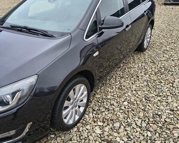 Черный Опель Астра, объемом двигателя 2 л и пробегом 175 тыс. км за 8300 $, фото 1 на Automoto.ua