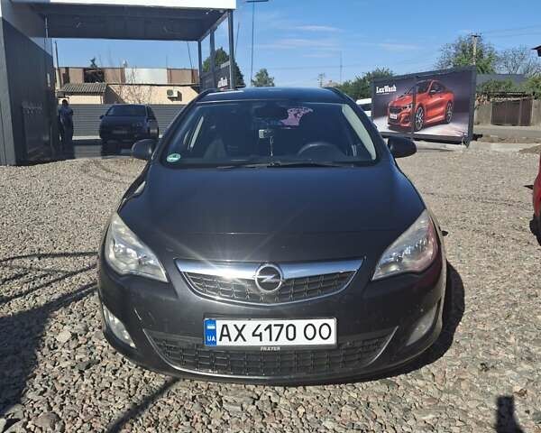 Черный Опель Астра, объемом двигателя 1.69 л и пробегом 271 тыс. км за 7700 $, фото 1 на Automoto.ua