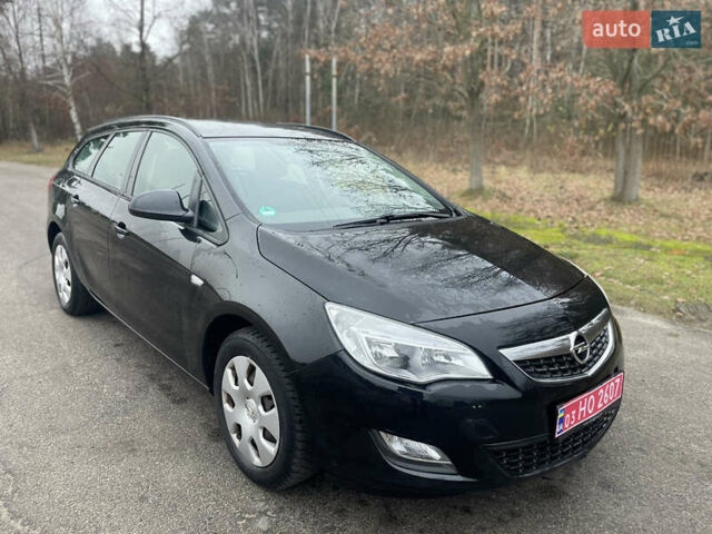 Черный Опель Астра, объемом двигателя 1.4 л и пробегом 210 тыс. км за 5900 $, фото 1 на Automoto.ua