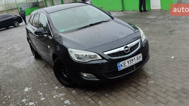 Черный Опель Астра, объемом двигателя 2 л и пробегом 232 тыс. км за 8700 $, фото 1 на Automoto.ua