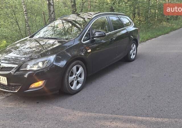 Черный Опель Астра, объемом двигателя 1.96 л и пробегом 241 тыс. км за 7300 $, фото 1 на Automoto.ua