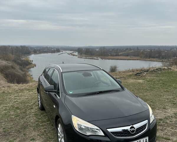 Черный Опель Астра, объемом двигателя 1.69 л и пробегом 221 тыс. км за 8500 $, фото 1 на Automoto.ua