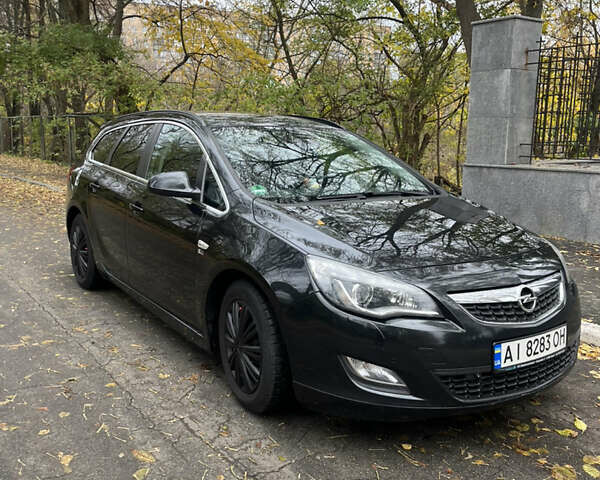 Черный Опель Астра, объемом двигателя 1.7 л и пробегом 275 тыс. км за 7400 $, фото 1 на Automoto.ua