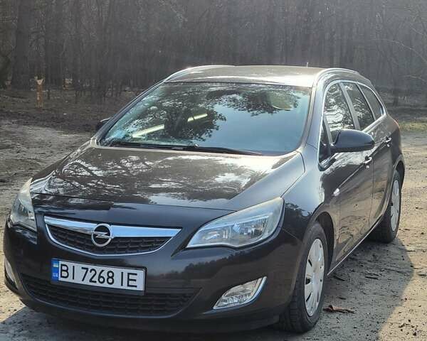Черный Опель Астра, объемом двигателя 1.3 л и пробегом 171 тыс. км за 6999 $, фото 1 на Automoto.ua