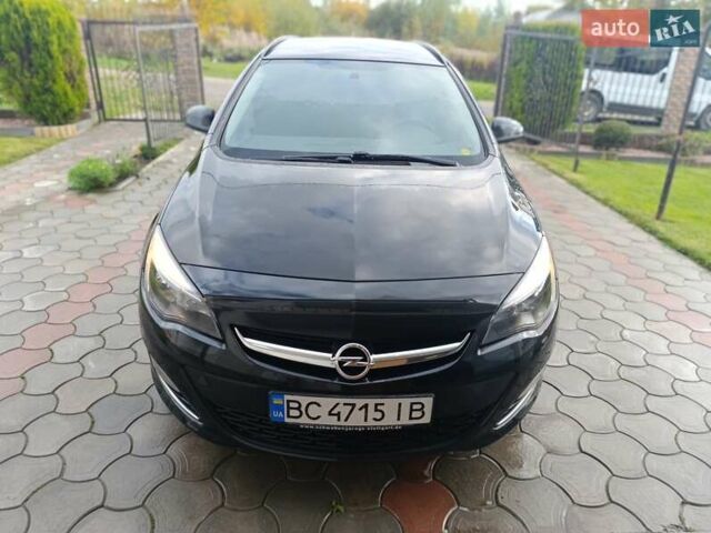 Черный Опель Астра, объемом двигателя 1.69 л и пробегом 230 тыс. км за 8000 $, фото 1 на Automoto.ua