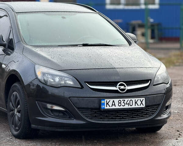 Черный Опель Астра, объемом двигателя 1.7 л и пробегом 300 тыс. км за 6150 $, фото 1 на Automoto.ua
