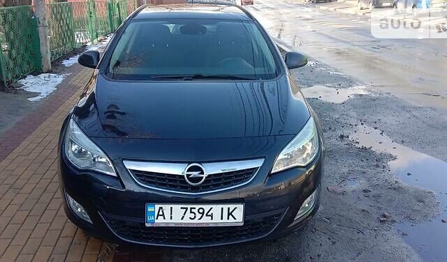 Черный Опель Астра, объемом двигателя 1.7 л и пробегом 293 тыс. км за 6300 $, фото 1 на Automoto.ua