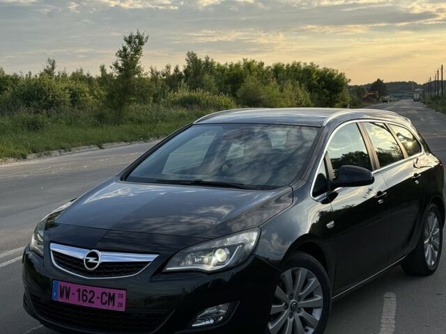 Чорний Опель Астра, об'ємом двигуна 0 л та пробігом 210 тис. км за 7499 $, фото 1 на Automoto.ua