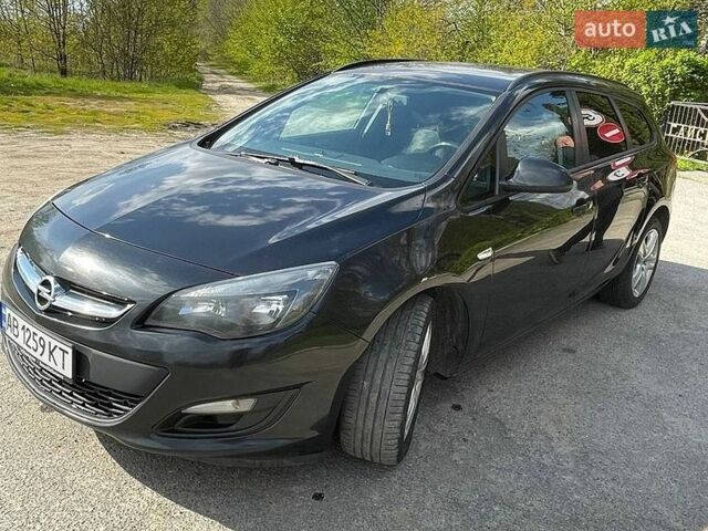 Черный Опель Астра, объемом двигателя 1.69 л и пробегом 220 тыс. км за 7200 $, фото 1 на Automoto.ua