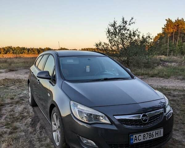 Черный Опель Астра, объемом двигателя 1.2 л и пробегом 261 тыс. км за 6500 $, фото 1 на Automoto.ua