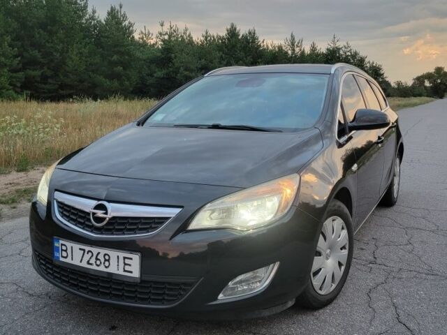 Черный Опель Астра, объемом двигателя 1.2 л и пробегом 180 тыс. км за 7200 $, фото 1 на Automoto.ua