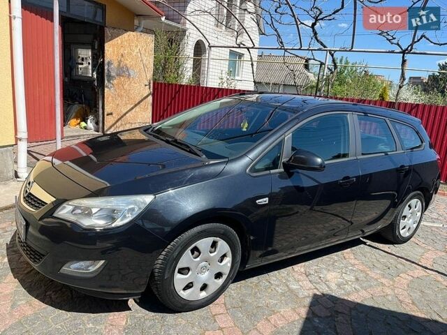 Черный Опель Астра, объемом двигателя 1.3 л и пробегом 256 тыс. км за 6600 $, фото 1 на Automoto.ua