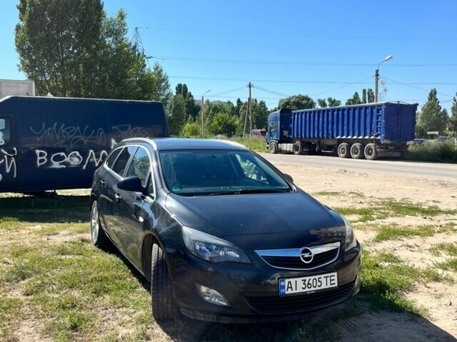 Черный Опель Астра, объемом двигателя 1.7 л и пробегом 231 тыс. км за 7200 $, фото 1 на Automoto.ua