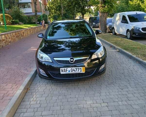 Черный Опель Астра, объемом двигателя 1.4 л и пробегом 167 тыс. км за 6800 $, фото 1 на Automoto.ua