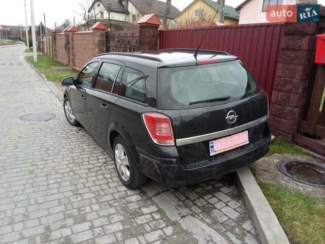 Черный Опель Астра, объемом двигателя 1.69 л и пробегом 260 тыс. км за 5600 $, фото 1 на Automoto.ua